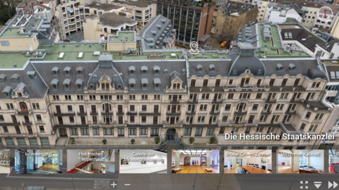 Screenshot der Startseite „Die Hessische Staatskanzlei“ aus dem virtuellen Rundgang mit einer Luftaufnahme der Staatskanzlei Screenshot der Startseite „Die Hessische Staatskanzlei“ aus dem virtuellen Rundgang mit einer Luftaufnahme der Staatskanzlei